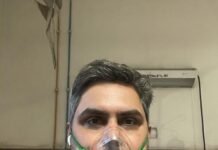 കോവിഡ് കിടക്കയിൽ ഓക്സിജൻ മാസ്കുമായി കേസ് വാദിച്ച് മലയാളി അഭിഭാഷകൻ; പ്രശംസയുമായി ഡൽഹി ഹൈക്കോടതി