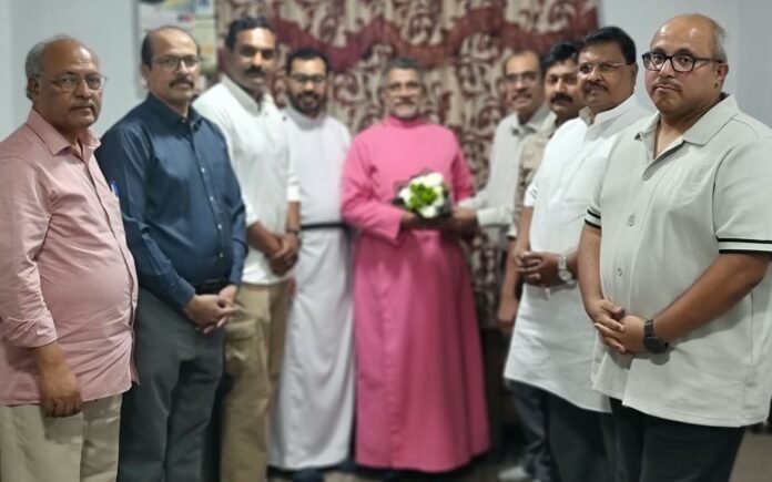 YMCA members with Thirumeni